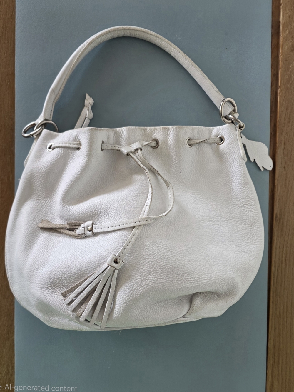 Roots White Leather Drawstring Hobo Bag